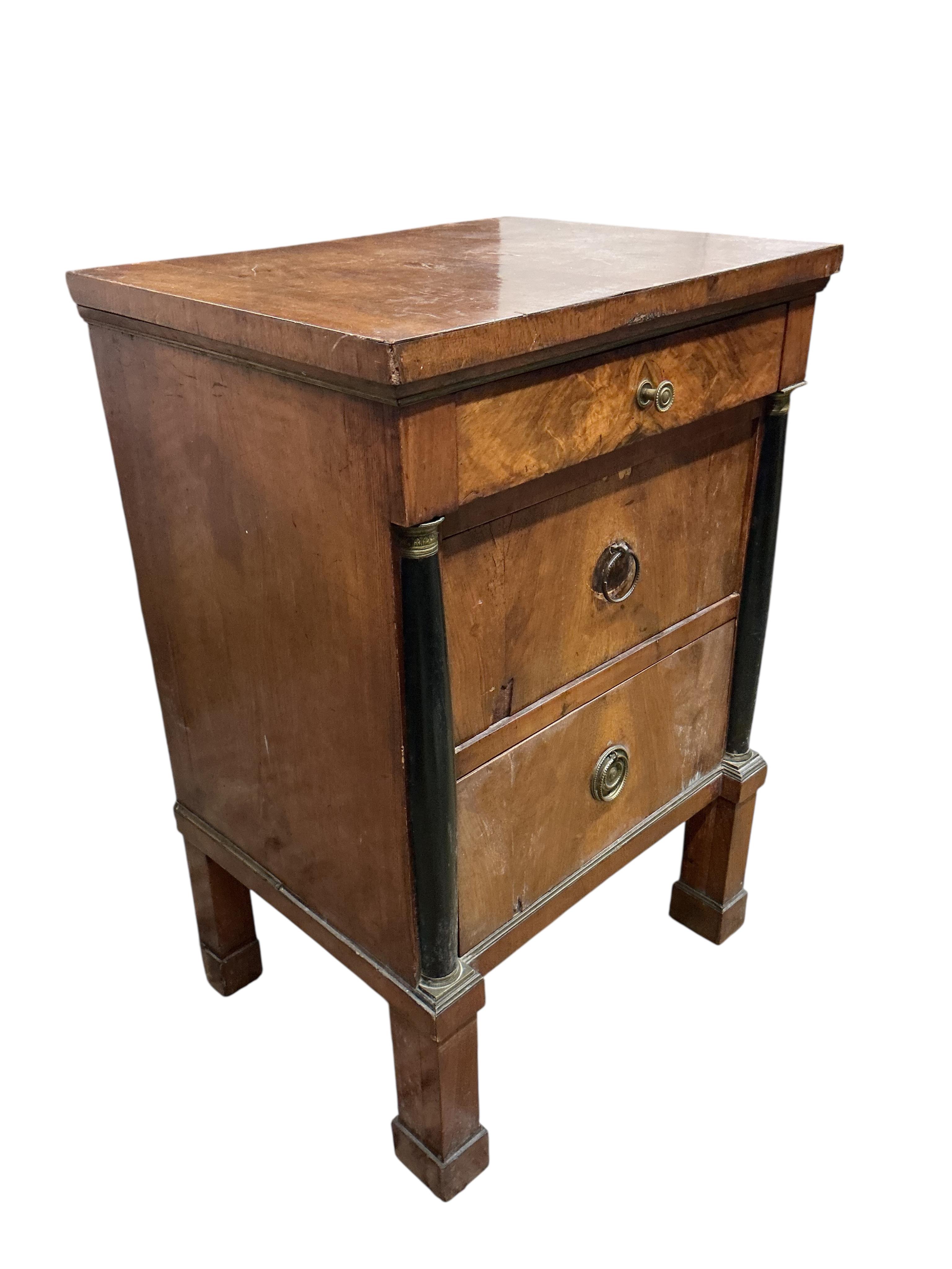A 19th century Biedermeir style part ebonised walnut narrow commode, width 47cm, depth 44cm, height 84cm